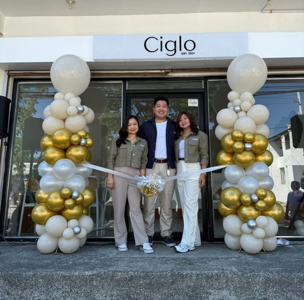 Ciglo Coffee Shop owners in front of the cafe